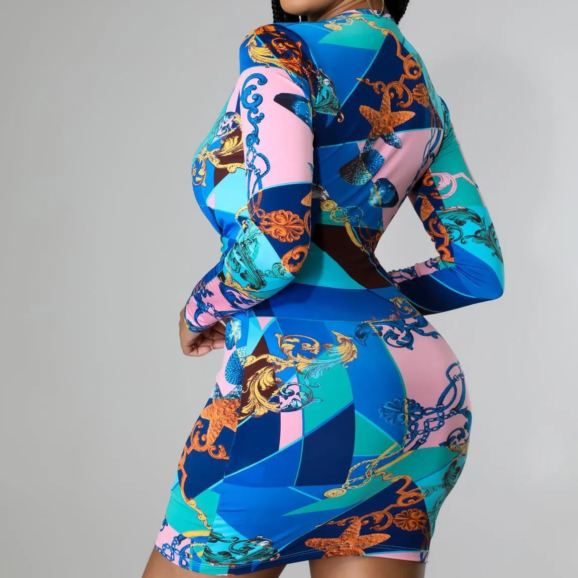 Vibrant Long-Sleeve Plunging Neckline Printed Mini Dress