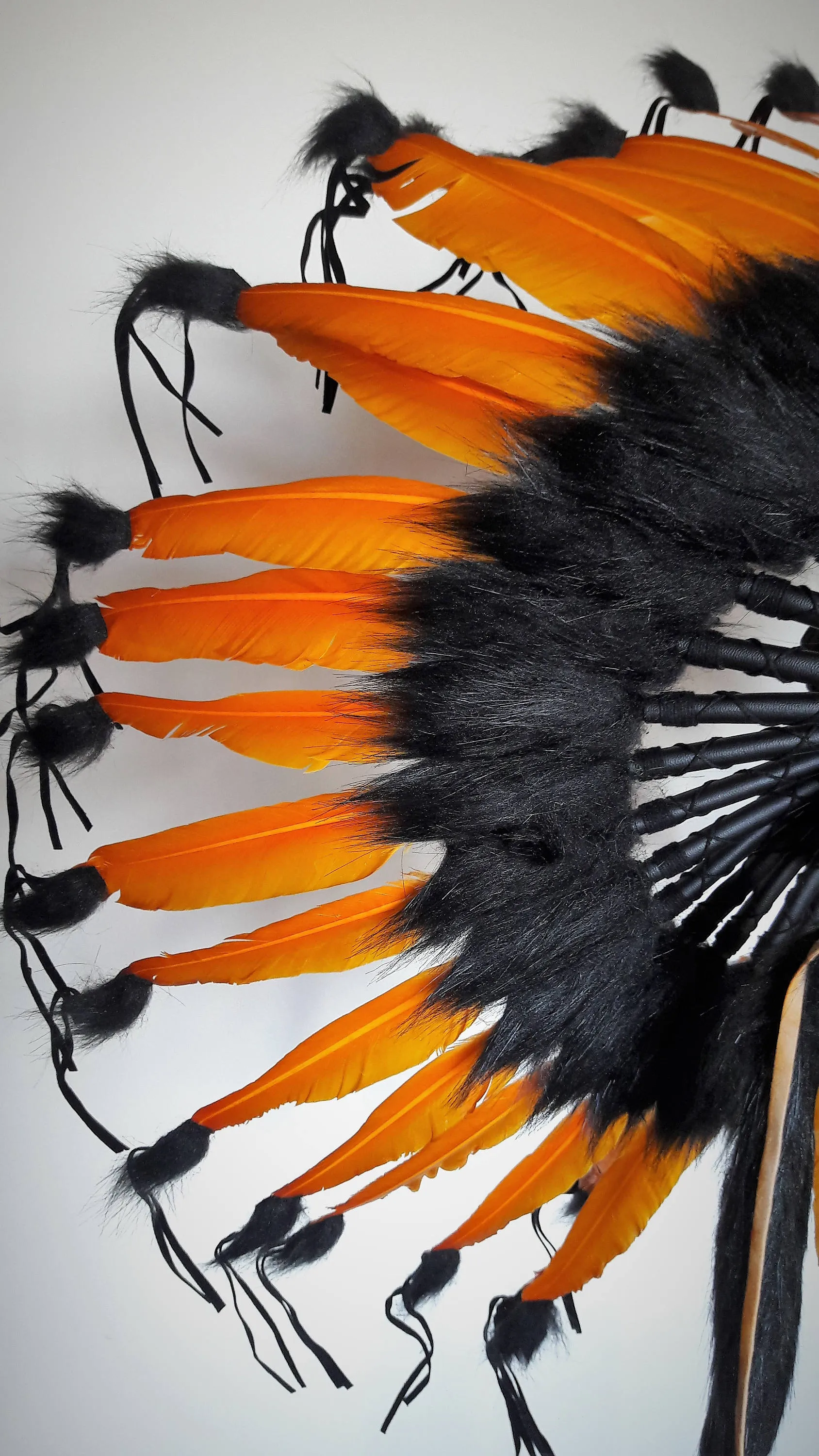 X56 -  Orange and black Chief indian Feather Headdress .