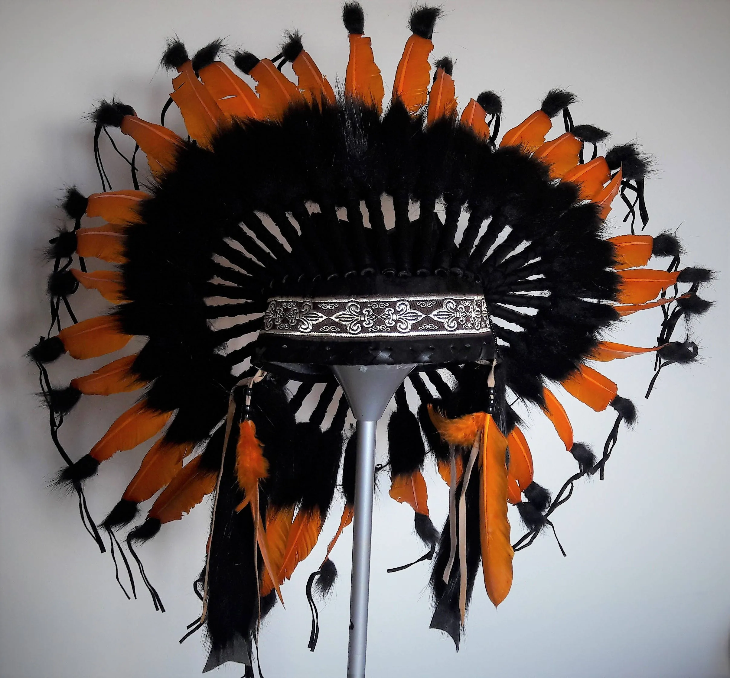 X56 -  Orange and black Chief indian Feather Headdress .