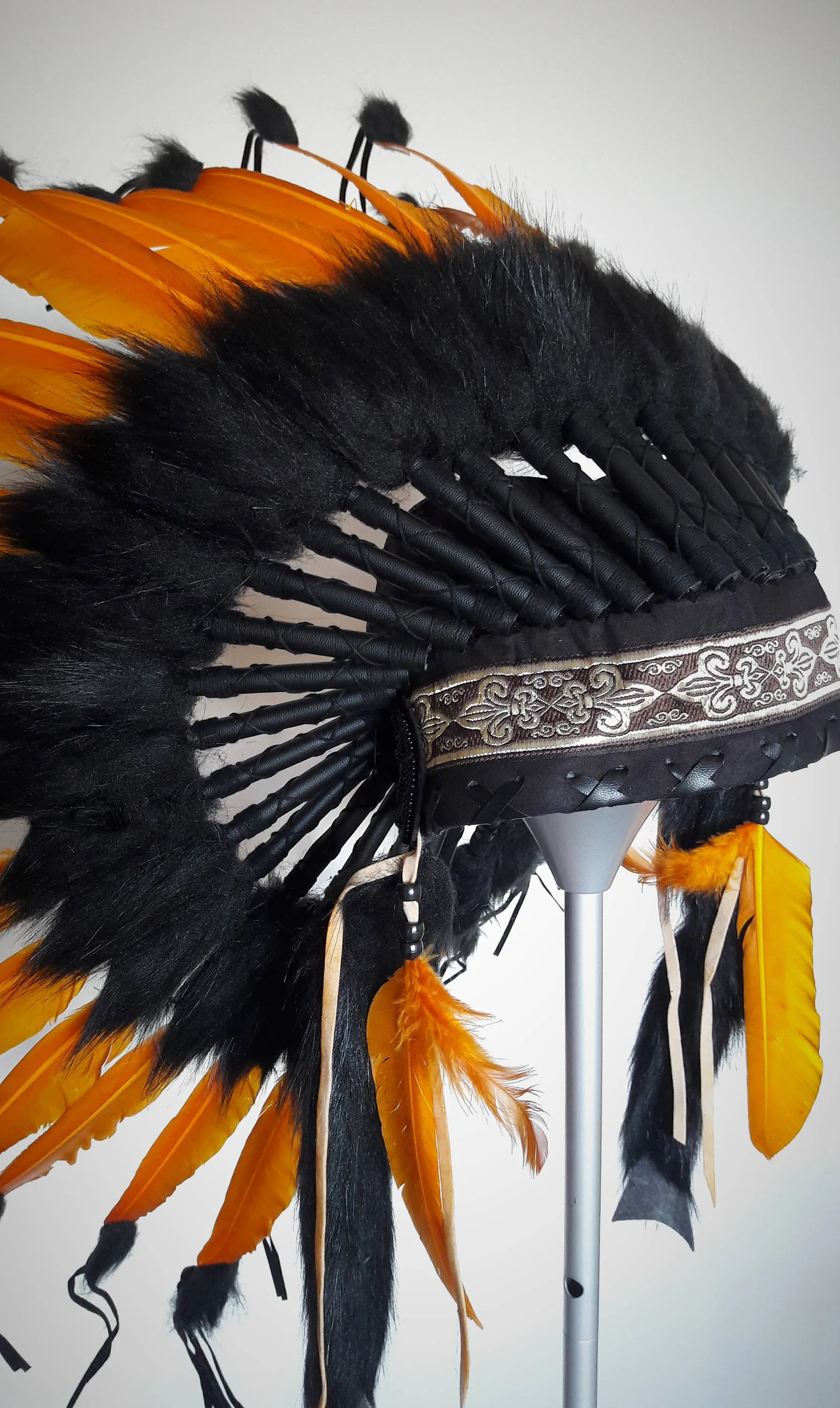 X56 -  Orange and black Chief indian Feather Headdress .